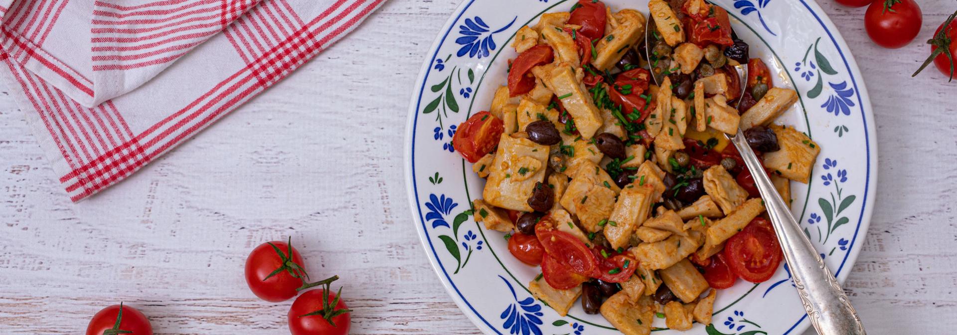 Fillets with tomatoes and olives